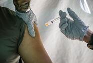 A Marine receives the Moderna COVID-19 vaccine at the naval hospital on Camp Foster, Okinawa, Feb. 18, 2021.